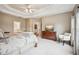 Bright bedroom with a trey ceiling, neutral walls, and bright natural light at 1800 Hunters Moon Dr, Alpharetta, GA 30005