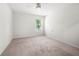 Carpeted bedroom featuring a ceiling fan at 193 Treeline Trl, Canton, GA 30115
