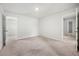 Carpeted bedroom with doors leading to a closet and an attached bathroom at 193 Treeline Trl, Canton, GA 30115
