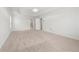 Bright primary bedroom with neutral carpet and tray ceilings at 193 Treeline Trl, Canton, GA 30115