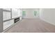 Bonus room with a fireplace and built-in shelving at 193 Treeline Trl, Canton, GA 30115