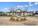 The clubhouse has beautiful landscaping and a covered porch at 193 Treeline Trl, Canton, GA 30115