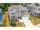 Attractive two-story home with a two car garage and manicured lawn at 193 Treeline Trl, Canton, GA 30115
