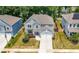 Beautiful two-story home with a well-manicured lawn and attached two car garage at 193 Treeline Trl, Canton, GA 30115