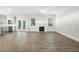 Living room open to kitchen features fireplace, windows and sliding glass doors at 193 Treeline Trl, Canton, GA 30115