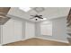 Bedroom featuring vinyl plank flooring, neutral walls, and generous closet space at 271 Brooks Rackley Rd, Dallas, GA 30157
