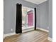 Bedroom with laminate floors and a bright window at 271 Brooks Rackley Rd, Dallas, GA 30157