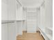 Spacious walk-in closet with built-in shelving and drawers, offering ample storage at 271 Brooks Rackley Rd, Dallas, GA 30157