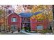 Charming two-story brick home with manicured landscaping and mature trees at 271 Brooks Rackley Rd, Dallas, GA 30157