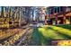 Beautiful view of the back of the house, driveway, trees and a retaining wall at 271 Brooks Rackley Rd, Dallas, GA 30157