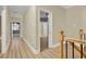 Hallway with laminate flooring and stairway view at 271 Brooks Rackley Rd, Dallas, GA 30157