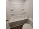 Full bathroom featuring white tub/shower combo and white walls at 558 Fairview Oak Pl, Dallas, GA 30157