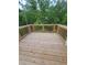 Wooden deck overlooking lush trees and greenery, offering a relaxing outdoor space at 558 Fairview Oak Pl, Dallas, GA 30157
