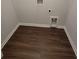 View of the laundry room with vinyl floors and utility connections in a new construction home at 558 Fairview Oak Pl, Dallas, GA 30157