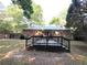 Backyard featuring a wooden deck and fencing for privacy and outdoor enjoyment at 2225 Harold Se Ln, Smyrna, GA 30080