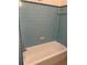 Bathroom with baby blue tile shower and tub combo at 2225 Harold Se Ln, Smyrna, GA 30080