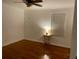 A bedroom with neutral walls, hardwood flooring, and ample natural light at 2225 Harold Se Ln, Smyrna, GA 30080