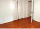 Bedroom with wood floors and large closet at 2225 Harold Se Ln, Smyrna, GA 30080