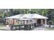 Charming brick home with a metal roof and welcoming front gazebo at 2225 Harold Se Ln, Smyrna, GA 30080