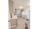 Well-lit kitchen featuring updated appliances and light-colored cabinets at 2225 Harold Se Ln, Smyrna, GA 30080