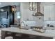 Elegant kitchen with a large island, pendant lighting, and stainless steel appliances at 235 W Marietta St, Canton, GA 30114