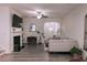 Bright living room with hardwood floors, cozy seating and a modern fireplace at 4175 Spring Valley Cir, Tucker, GA 30084