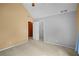Neutral bedroom with carpeted floors, vaulted ceiling, and ample closet space at 7071 Glen Cove Ln, Stone Mountain, GA 30087