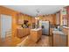 Traditional kitchen featuring wood cabinets, stainless appliances, and a functional center island at 7071 Glen Cove Ln, Stone Mountain, GA 30087