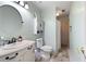 Bathroom featuring modern sink, medicine cabinet, and updated fixtures at 735 Wood Valley Trce, Roswell, GA 30076