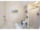 Bathroom featuring shower, tub, and toilet at 735 Wood Valley Trce, Roswell, GA 30076