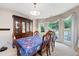 Dining room with window views, traditional furniture and natural light at 735 Wood Valley Trce, Roswell, GA 30076