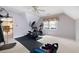 Bright exercise room with gym equipment, carpeting, and natural light at 735 Wood Valley Trce, Roswell, GA 30076