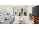 Comfortable living room featuring a plush sofa, carpet, and natural light at 735 Wood Valley Trce, Roswell, GA 30076