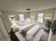 Cozy bedroom with ample natural light, modern decor, and comfortable furnishings at 819 Humphries St, Atlanta, GA 30310
