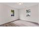 Bright and airy bedroom with hardwood floors, natural light, and minimalist design at 819 Humphries St, Atlanta, GA 30310