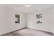 Bright bedroom with modern gray flooring and neutral walls for a calm and inviting space at 819 Humphries St, Atlanta, GA 30310