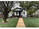 Well-maintained home with lush lawn and inviting front porch at 819 Humphries St, Atlanta, GA 30310