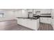 Stylish kitchen with island, modern fixtures and plenty of cabinet space at 819 Humphries St, Atlanta, GA 30310