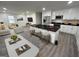 Bright open-concept living space featuring a modern kitchen with island and inviting living area at 819 Humphries St, Atlanta, GA 30310