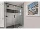 Modern bathroom features a glass-enclosed shower with elegant tile and modern fixtures at 819 Humphries St, Atlanta, GA 30310
