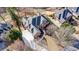 Aerial view of a brick house showcasing the roof, driveway, and landscaping at 2760 Sugarloaf Club Dr, Duluth, GA 30097