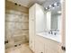 Bathroom with a glass-enclosed shower and vanity with decorative lighting at 2760 Sugarloaf Club Dr, Duluth, GA 30097