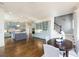 Open kitchen with stainless appliances, custom cabinets, large island and adjacent dining area at 2760 Sugarloaf Club Dr, Duluth, GA 30097