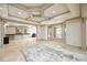 Spacious room with a bar area and bay windows, perfect for entertaining at 2760 Sugarloaf Club Dr, Duluth, GA 30097