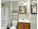 Full bathroom with updated vanity and a shower-tub combination at 3875 Sweetwater Dr, Cumming, GA 30041