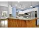 Stylish kitchen with granite countertops, stainless steel appliances, and a convenient breakfast bar at 3875 Sweetwater Dr, Cumming, GA 30041