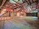 Unfinished basement with exposed ceiling, studded walls, and concrete floors at 803 Plantation Ridge Overlook, Woodstock, GA 30188