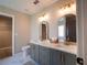 Bright bathroom with double vanity, stone countertops, and modern fixtures at 803 Plantation Ridge Overlook, Woodstock, GA 30188