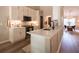 Well-equipped kitchen featuring quartz counters, stainless steel appliances, and ample cabinetry at 803 Plantation Ridge Overlook, Woodstock, GA 30188