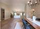 Spacious living room with hardwood floors and open floor plan to the dining area at 803 Plantation Ridge Overlook, Woodstock, GA 30188